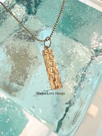 Image 1 of 14k vintage Hawaiian bar pendant 