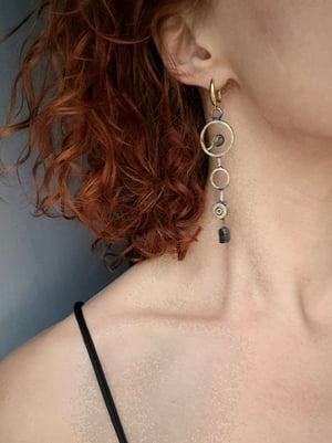Long earrings with bullet casings and green stones 