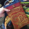 Image of Navy And Red Tapestry/Canvas Zipper Top Carry Case With Cross Body Strap