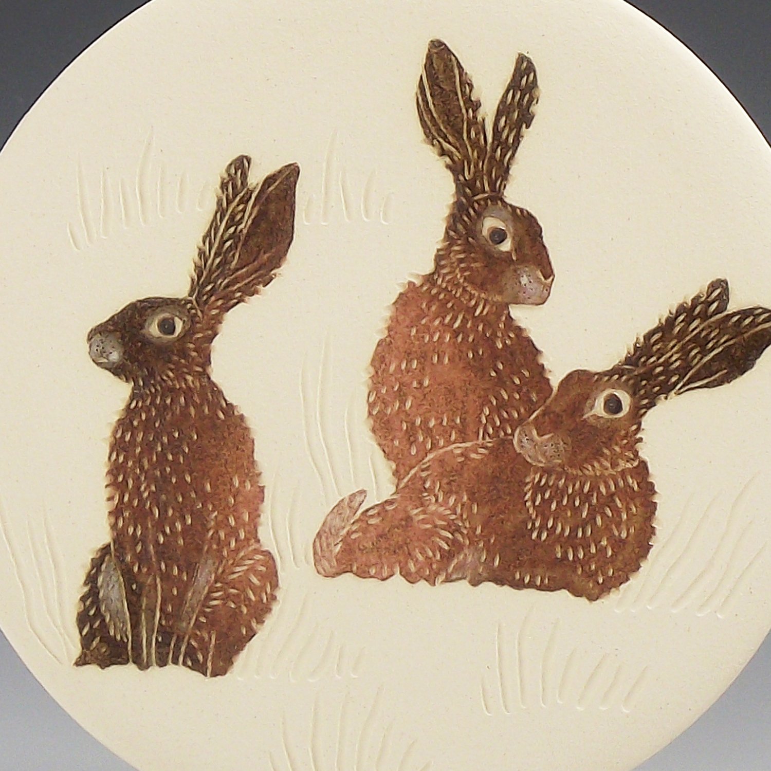 Image of Three Hares ceramic wall hanging 