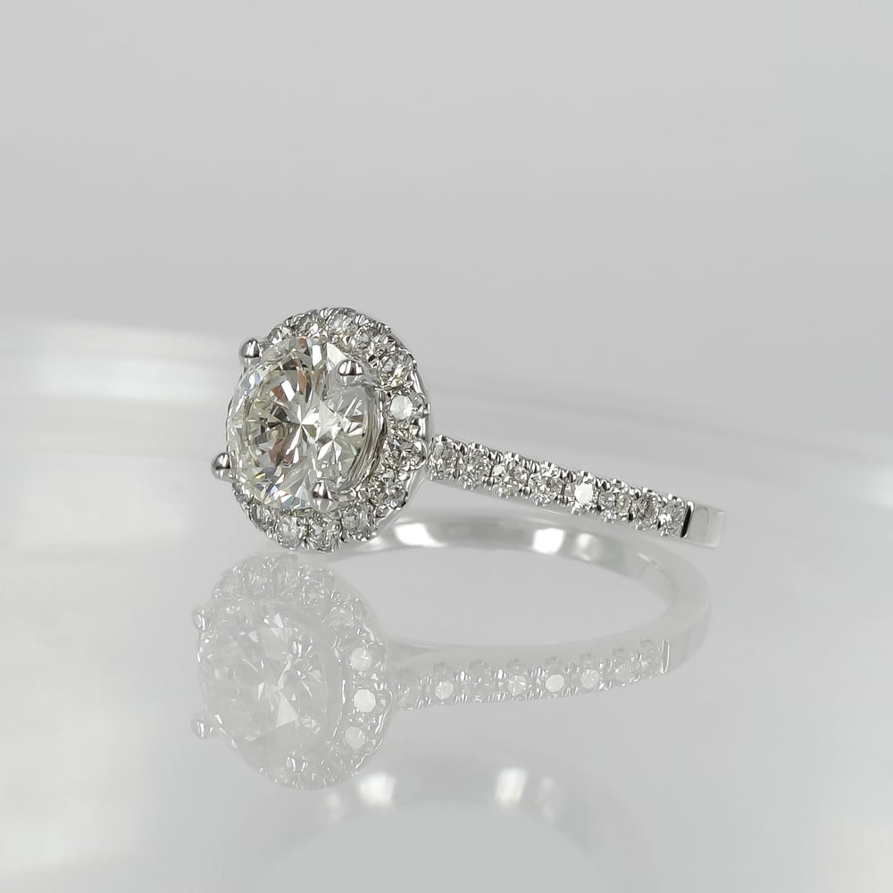 Image of 18ct white gold halo engagement ring. PJ5899