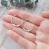 Silver Stardust faceted hoop earrings