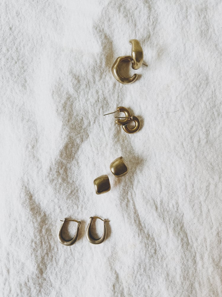 Image of organic shaped brass small hoops
