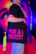 PRIDE IS A PROTEST Tote bag (Black, pink print)