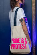 PRIDE IS A PROTEST Tote bag (White, pink print and navy handle)