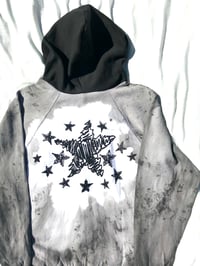 Image of black stars shine the bright hand dyed hoodie 