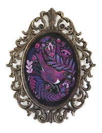 Purple Gem in fancy oval frame