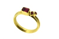 Image 1 of Emerald cut sapphire and round spinel 18ct gold ring  Traditional ring with a contemporary aesthetic