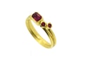 Emerald cut ruby and round spinel 18ct gold ring  Traditional ring with a contemporary aesthetic