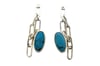 Turquoise chain link earrings set in sterling silver. 