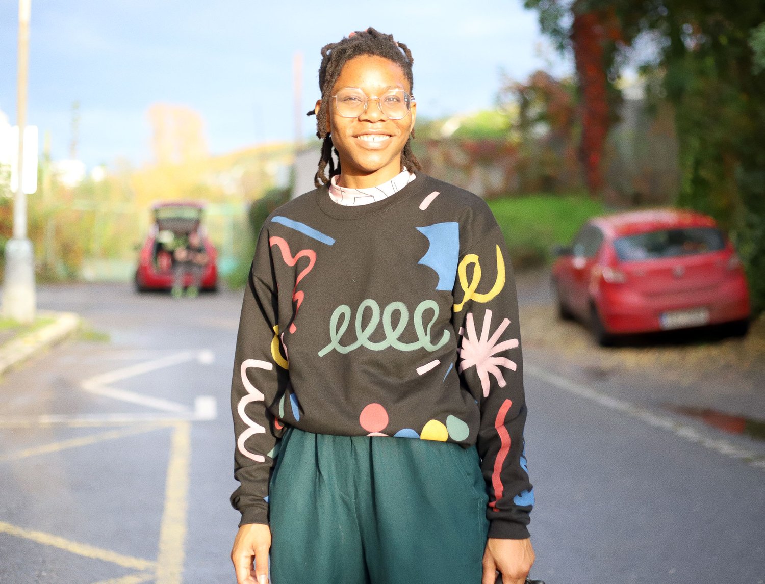 Image of PAINTED BLACK UNISEX SWEATSHIRT