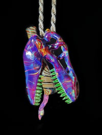 Image 3 of Amber purple T-Rex skull pendant with illuminati teeth, joint tip and L.S D. Tongue 🦖💀💨👅