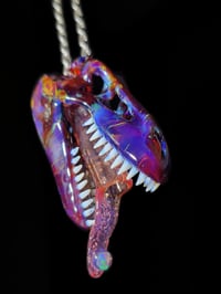 Image 2 of Amber purple T-Rex skull pendant with an L.S.D. joint tip 🦖💀💨👅