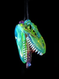 Image 1 of Titan v1 T-Rex skull pendant with a dosed L.S.D. tongue joint tip 🦖💀💨👅