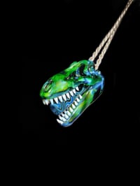 Image 1 of Green X T-Rex skull pendant with a wig-wag joint tip 🦖💀💨