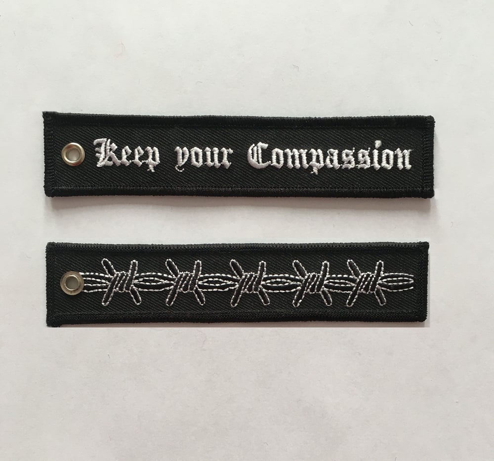 'keep your compassion' keychain 