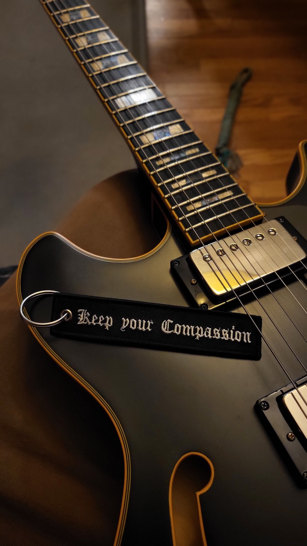 'keep your compassion' keychain 