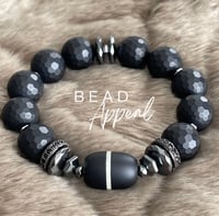 Image 1 of Matte Black Tibetan