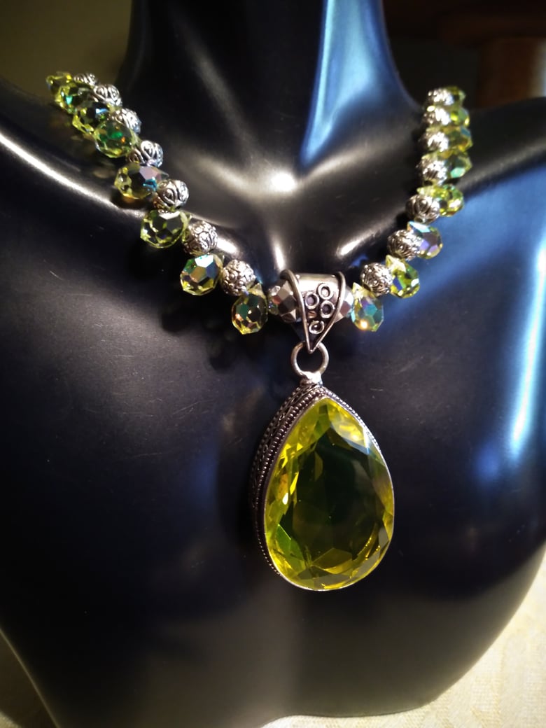 Image of PERIDOT WITH PRECIOSA TEARDROP CRYSTAL BEADS 