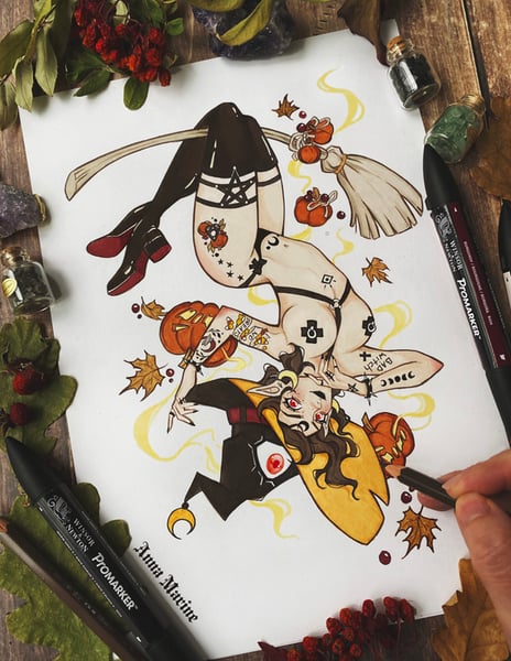 Image of Pumpkins and broomsticks