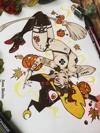 Image 2 of Pumpkins and broomsticks