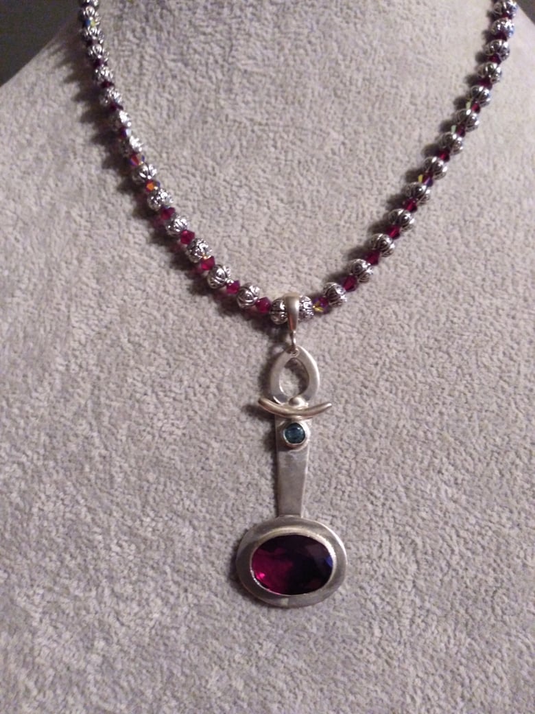 Image of GARNET AND BLUE TOPAZ PENDANT NECKLACE 