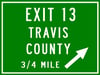 Exit 13 Travis County Sign