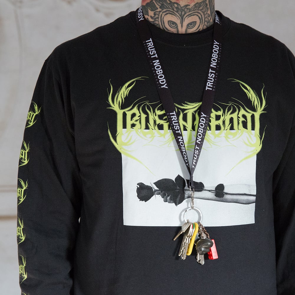 Image of 'Don't let the world harden you" Trust Nobody Longsleeve