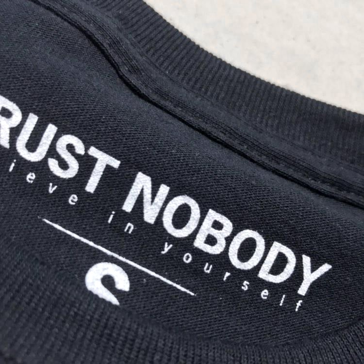 Image of 'Don't let the world harden you" Trust Nobody Longsleeve