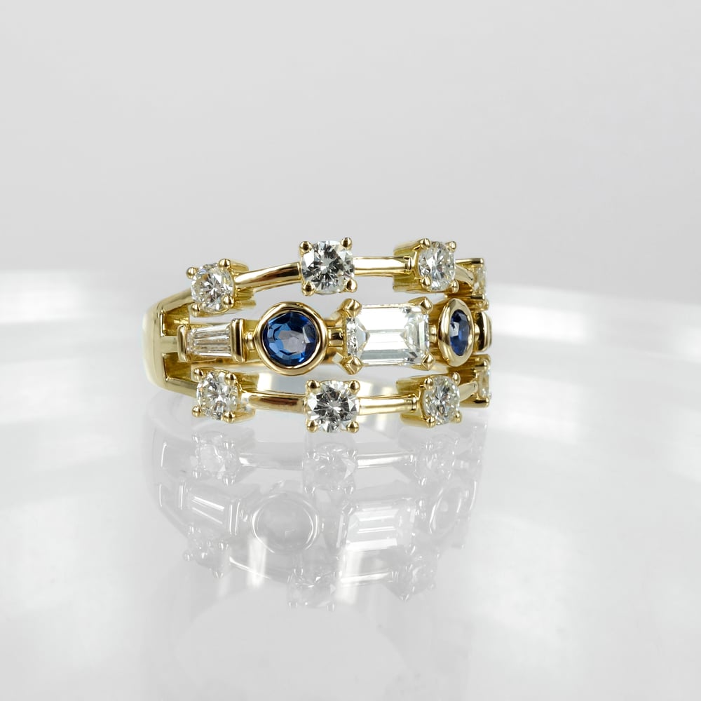 Image of 18ct yellow gold diamond and sapphire cocktail ring