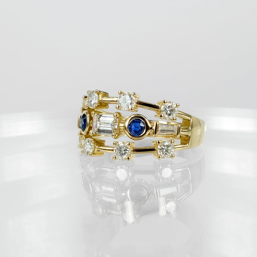 Image of 18ct yellow gold diamond and sapphire cocktail ring