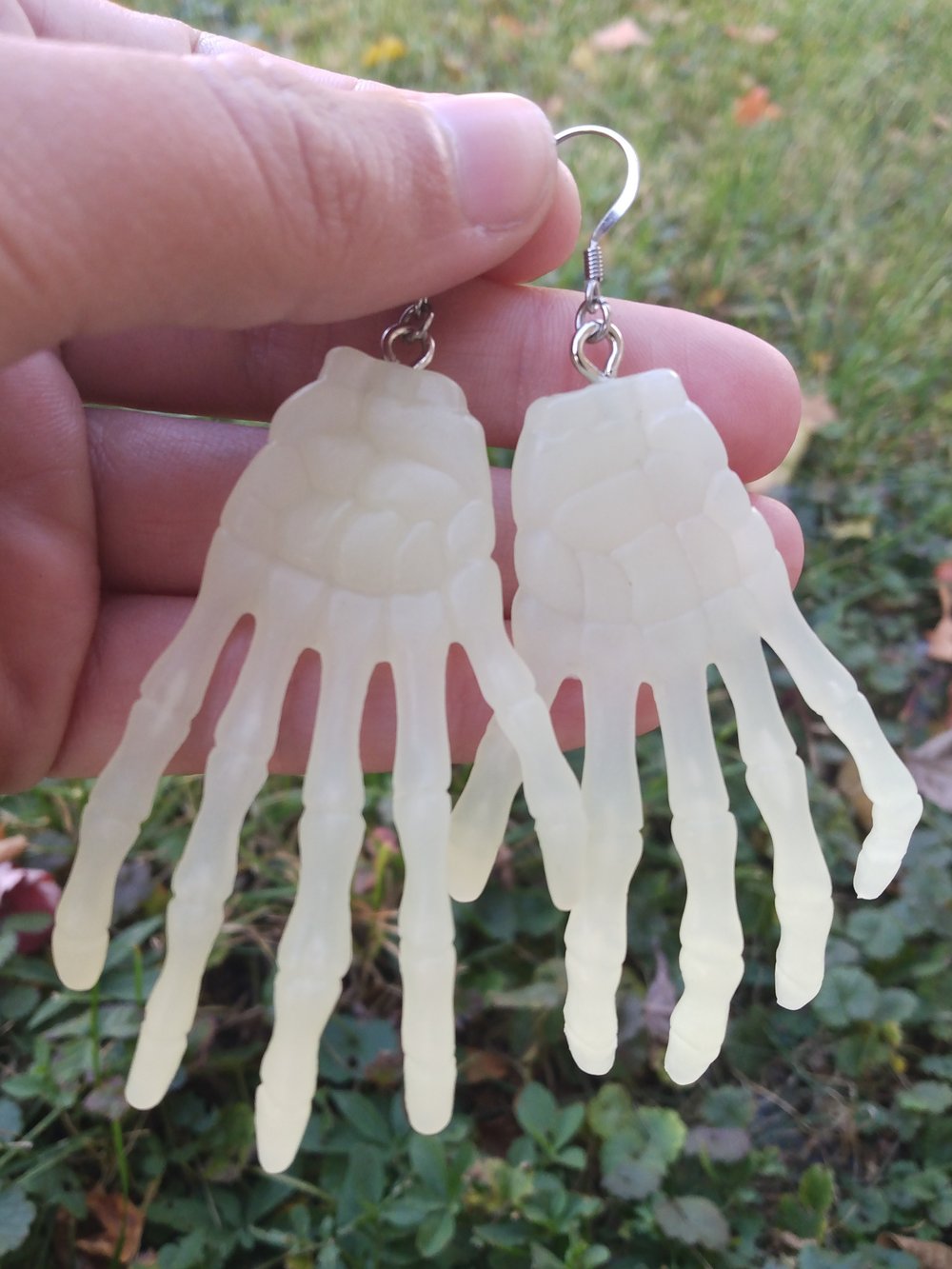 Glow in the dark skelly hand earrings