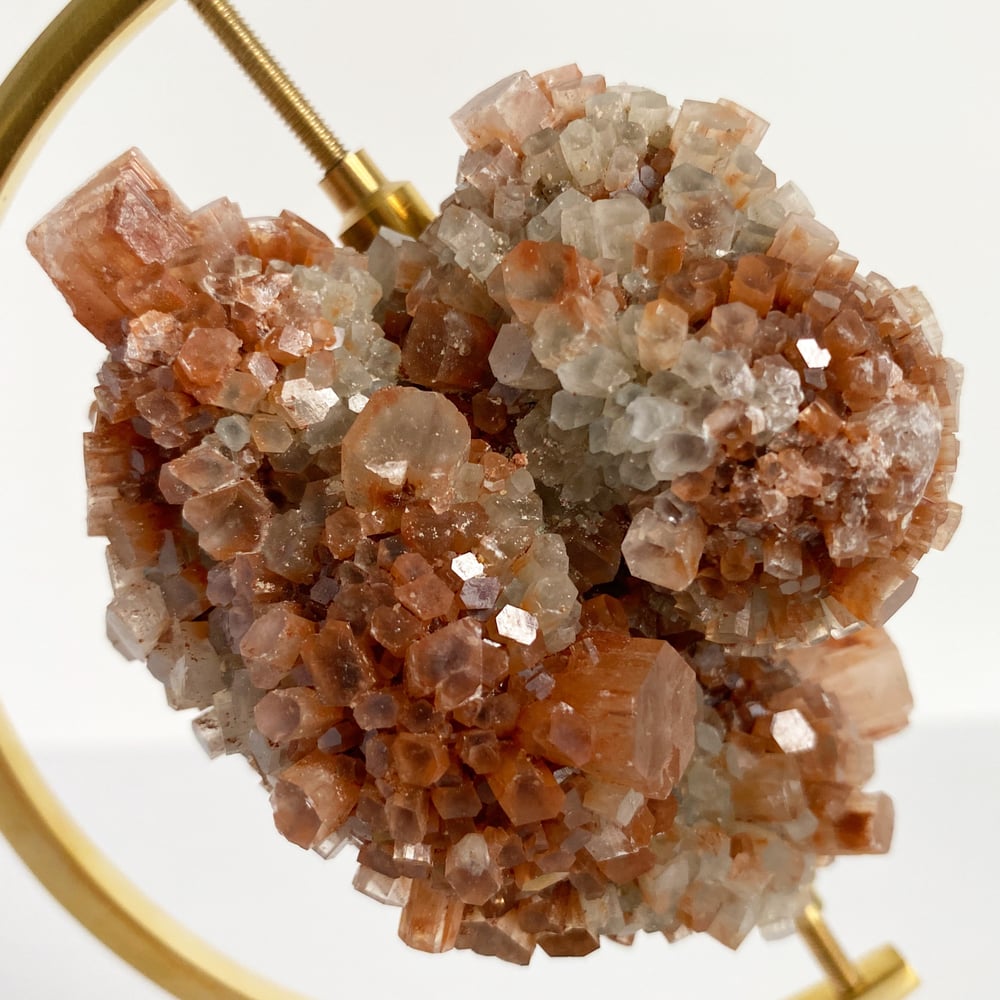 Image of Aragonite no.82 + Brass Arc Stand