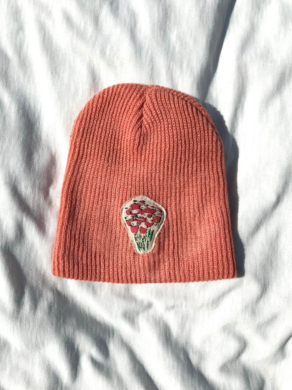 give me my fucking flowers beanie in pink 