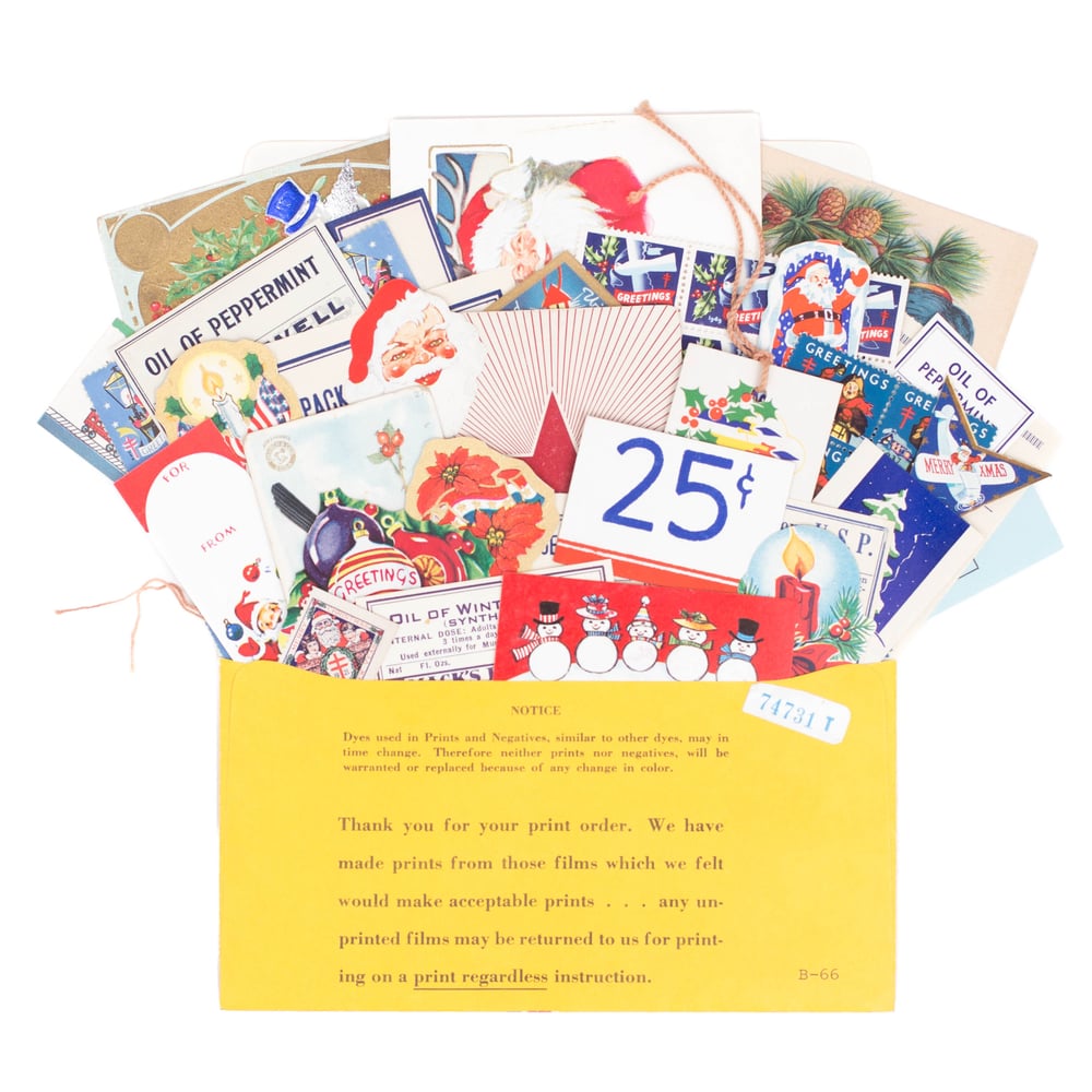 Image of Red, Blue, + Yellow Christmas Ephemera in Photo Envelope