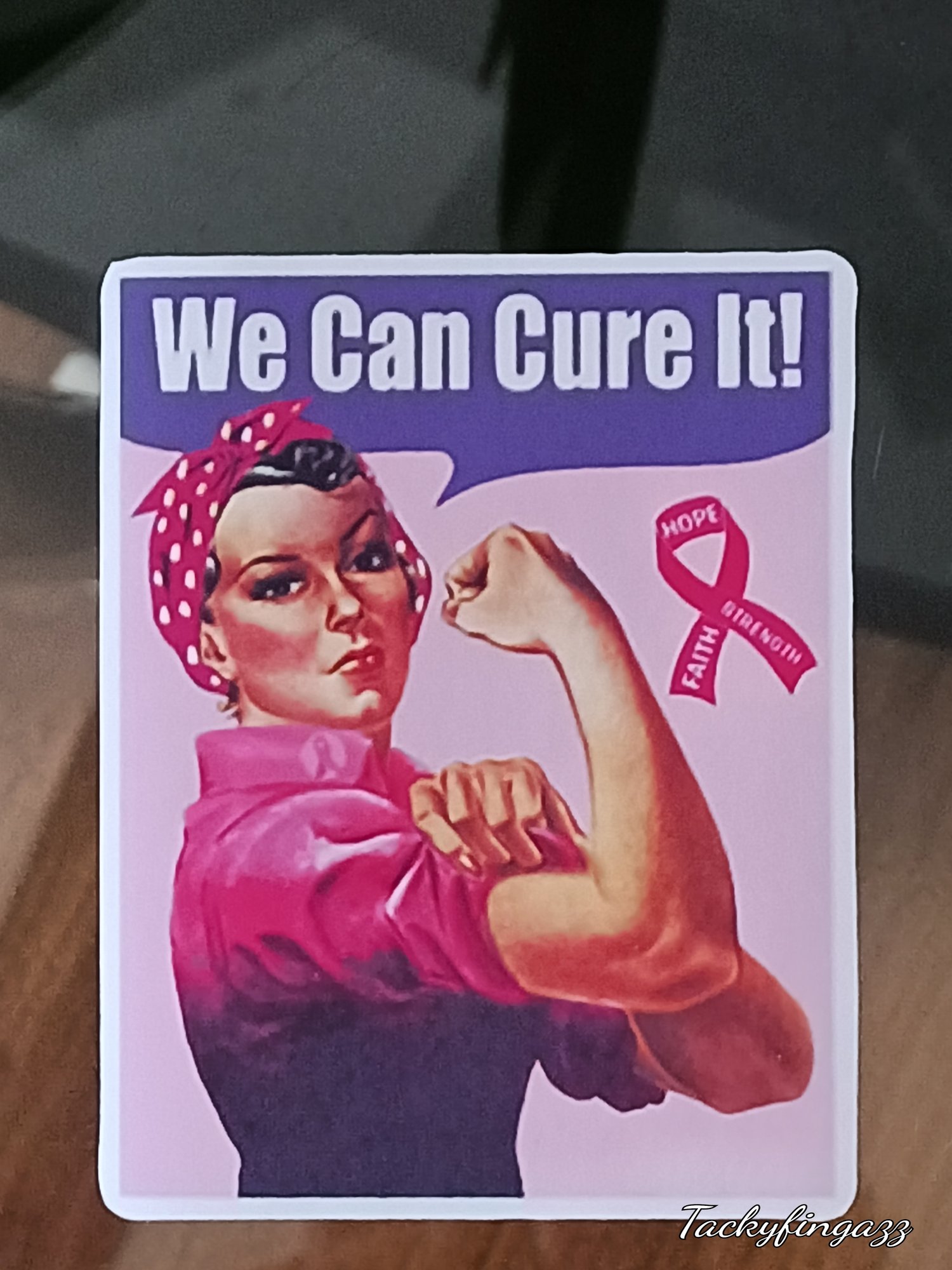 Image of we can cure Rossie riveter