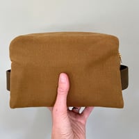 Image 1 of WAXED CANVAS WASHBAG IN TAN