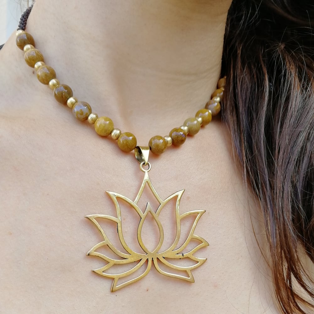 Image of Lotus with natural fossilized coral beads