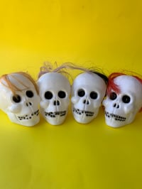 Image 1 of Vintage Blowmold Skulls with hair