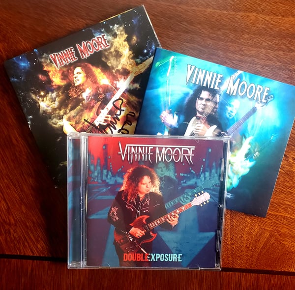 Image of Vinnie's latest three CDs autographed