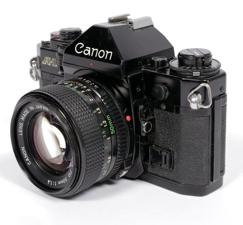 Image of Canon A-1 35mm SLR Film Camera with 50mm F1.4 FDn lens #554