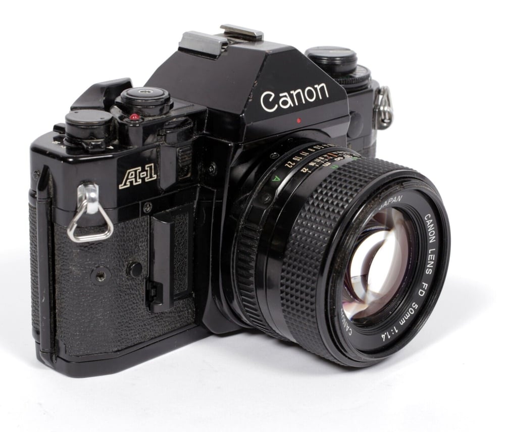 Image of Canon A-1 35mm SLR Film Camera with 50mm F1.4 FDn lens #554