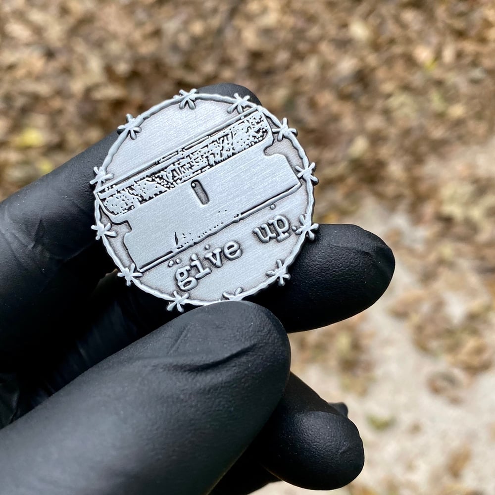 barbed razor pin / give up