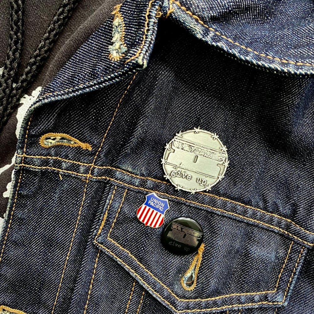 barbed razor pin / give up