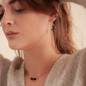 Image of Gold and black drop earrings