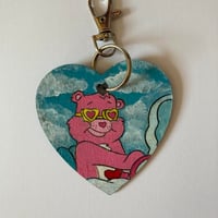 Image 2 of Care Bears Love-a-lot bear hand painted wooden heart shaped keychain 