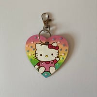 Image 1 of Rainbow heart glitter Hello Kitty hand painted wooden heart shaped keychain