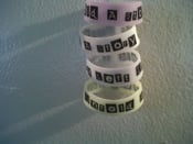 Image of 'A Story Left Untold' Logo "Glow in The Dark" Wristbands