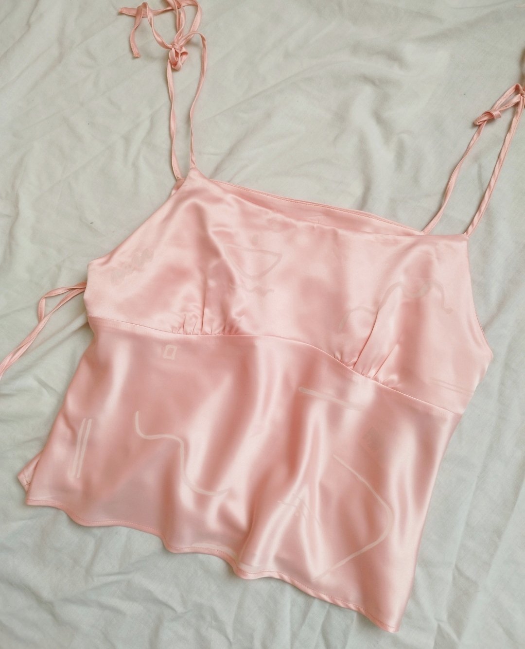 Image of pink linear cami top