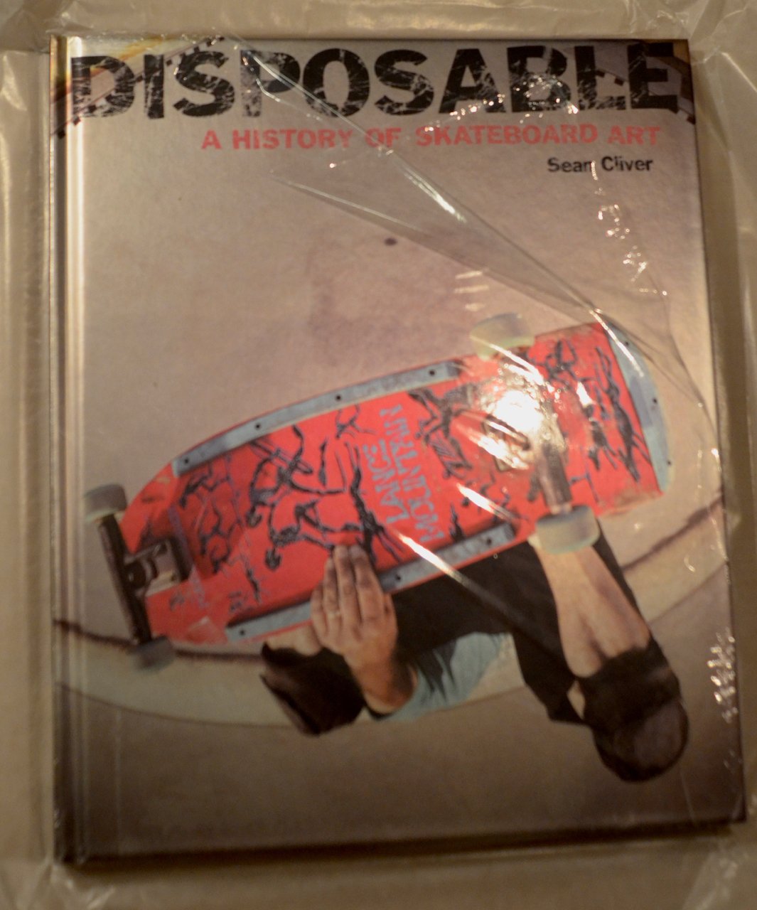 disposable a history of skateboard art by sean cliver - signed hardcover |  SKATEBOARDS AND GRAFFITI